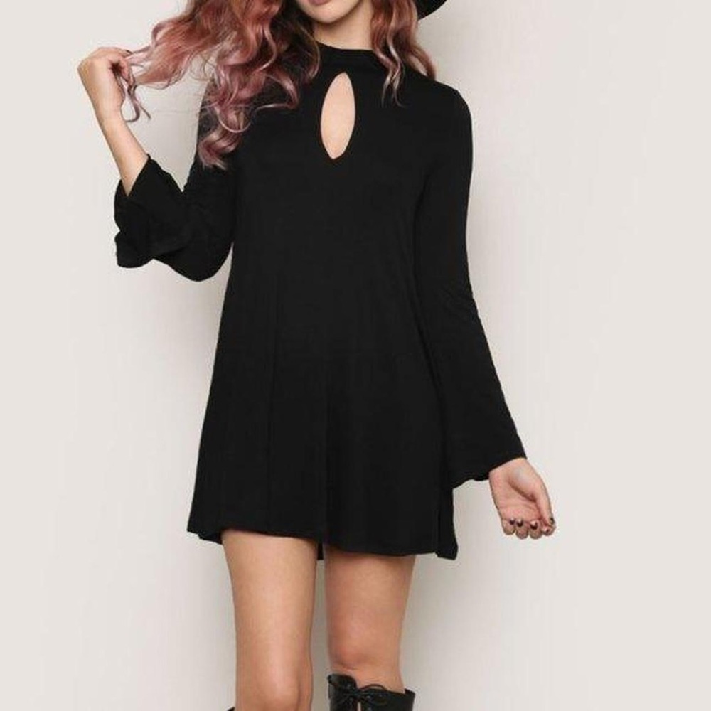 Gypsy warrior keyhole bell sleeve mock neck little black dress. Witchy flowy